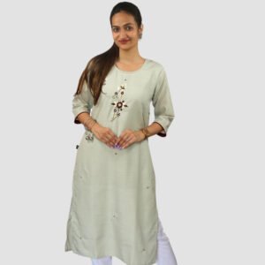 Model wearing chanderi silk light pastel grey kurta with handwork of embroidery in brown thread